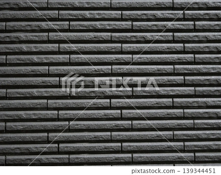 Dark gray stone wall texture Dark gray stone wall texture 139344451