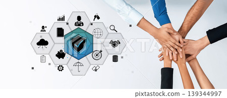 Collaborative Teamwork and Security Concept with Hands Joining Over Icons Representing Business, Technology and Data Protection Quark Collaborative Teamwork and Security Concept with Hands Joining Over Icons Representing Business, Technology and Data Protection Quark 139344997