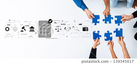 Collaborative Teamwork Concept with Hands Holding Blue Puzzle Pieces and Business Icons for Strategy and Problem Solving in Modern Workplace Trope Collaborative Teamwork Concept with Hands Holding Blue Puzzle Pieces and Business Icons for Strategy and Problem Solving in Modern Workplace Trope 139345017