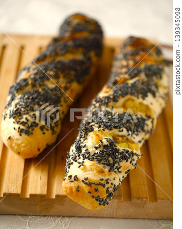 Sweet potato and black sesame soft French bread Sweet potato and black sesame soft French bread 139345098