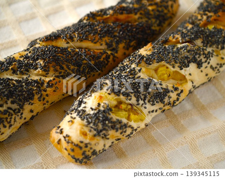 Sweet potato and black sesame soft French bread (landscape orientation) Sweet potato and black sesame soft French bread (landscape orientation) 139345115