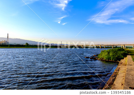 [Fukuoka] Early summer in Kurume: The Chikugo River flows beside Suiten-gu Shrine. 139345186