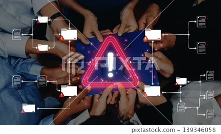 A group of diverse hands supports a digital warning sign, symbolizing urgent concerns in cybersecurity and data integrity within modern technology workplaces. Sigmoid A group of diverse hands supports a digital warning sign, symbolizing urgent concerns in cybersecurity and data integrity within modern technology workplaces. Sigmoid 139346058