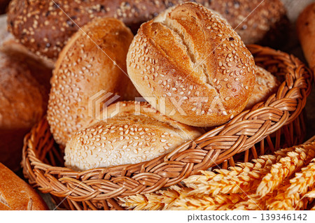 Fresh baked bread. Assorted bakery products loafs of bread and rolls... Fresh baked bread. Assorted bakery products loafs of bread and rolls... 139346142