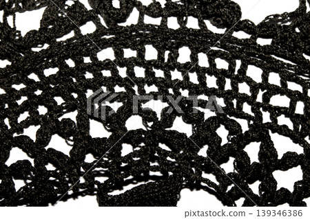 Close up of vintage black gothic lace fabric white on black background embroidery 139346386