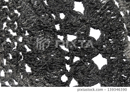 Close up of vintage black gothic lace fabric white on black background embroidery Close up of vintage black gothic lace fabric white on black background embroidery 139346390