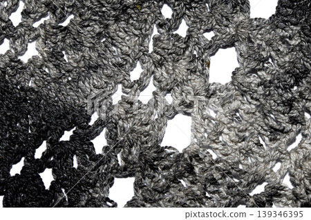 Close up of vintage black gothic lace fabric white on black background embroidery 139346395