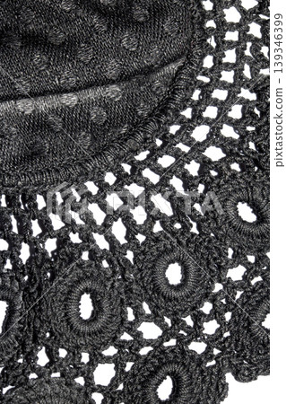 Close up of vintage black gothic lace fabric white on black background embroidery 139346399