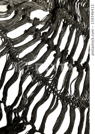 Close up of vintage black gothic lace fabric white on black background embroidery Close up of vintage black gothic lace fabric white on black background embroidery 139346413
