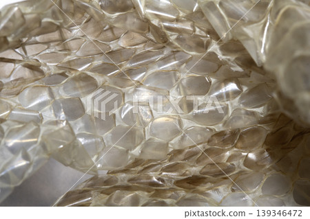 Close up of shedded snake skin snakeskin textured reptile background Close up of shedded snake skin snakeskin textured reptile background 139346472