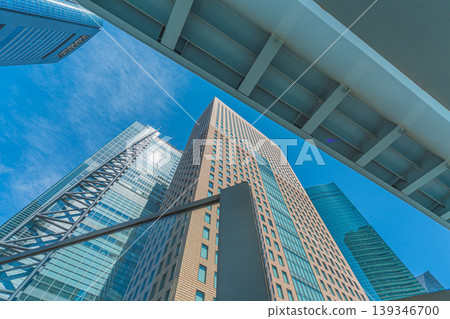 Shiodome's skyscrapers and the refreshing blue sky Shiodome's skyscrapers and the refreshing blue sky 139346700