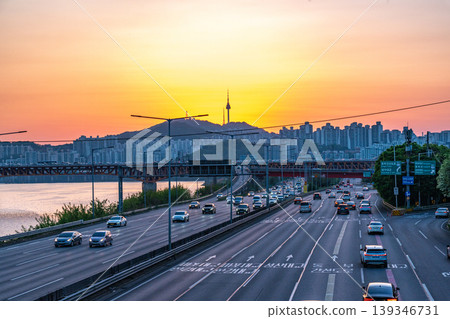 Seoul, South Korea - Apr. 24, 2026 : Sunset Cityscape of Seoul with N Seoul Tower, Seongsu Bridge and Busy Traffic on Gangbyeonbukro Highway Seoul, South Korea - Apr. 24, 2026 : Sunset Cityscape of Seoul with N Seoul Tower, Seongsu Bridge and Busy Traffic on Gangbyeonbukro Highway 139346731