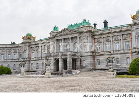 The facade of the Akasaka Palace State Guest House, standing under a cloudy sky. The facade of the Akasaka Palace State Guest House, standing under a cloudy sky. 139346892
