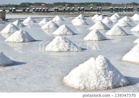 saline water making dry salt by solar evaporation Thai cultures and agriculture manufacturing in farm on sunny day saline water making dry salt by solar evaporation Thai cultures and agriculture manufacturing in farm on sunny day 139347370