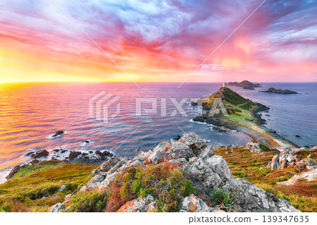 Fantastic sunset over Torra di a Parata with Genoese Tower and Archipelago of Sanguinaires islands at background. Fantastic sunset over Torra di a Parata with Genoese Tower and Archipelago of Sanguinaires islands at background. 139347635