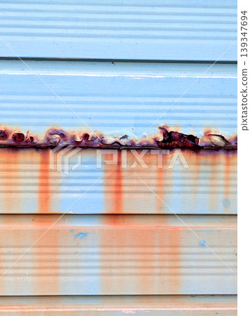 Lined rusted and painted weathered metal background patina Lined rusted and painted weathered metal background patina 139347694