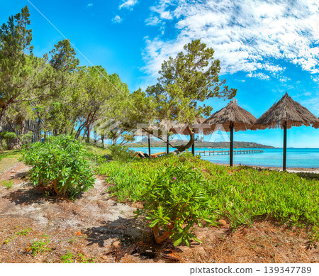Breathtaking view of beach of Santa Giulia resort. Breathtaking view of beach of Santa Giulia resort. 139347789