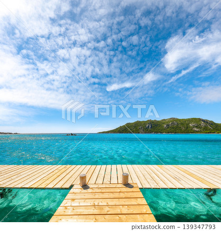 Breathtaking landscape with wooden pier on Santa Giulia beach. 139347793