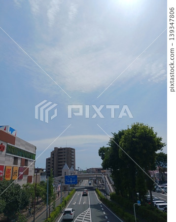 Afternoon on a commercial street, overpass and blue sky Afternoon on a commercial street, overpass and blue sky 139347806