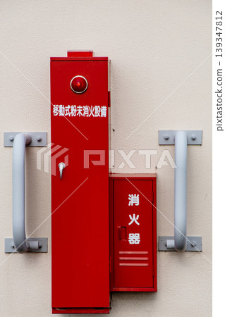 Fire extinguisher installed in the parking lot Fire extinguisher installed in the parking lot 139347812