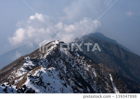 Beautiful view of the mountains with High camp (3,580 m) on Mardi Himal trekking route in Annapurna region of Nepal. Beautiful view of the mountains with High camp (3,580 m) on Mardi Himal trekking route in Annapurna region of Nepal. 139347898