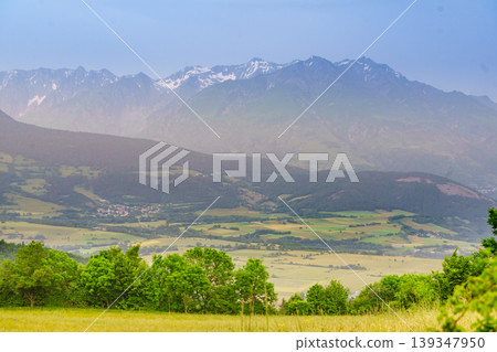 Summer valley and mountains on horizon. L'Obiou in Alps, France. Summer valley and mountains on horizon. L'Obiou in Alps, France. 139347950