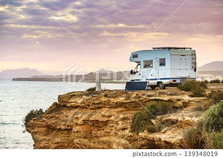Camper vehicle capming on coast cliff, region of Mazarron in Murcia Spain. 139348019