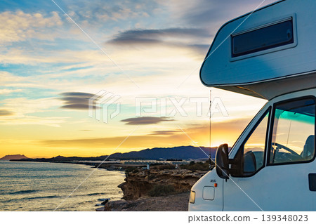 Caravan recreational vehicle camping on sea shore. Caravan recreational vehicle camping on sea shore. 139348023