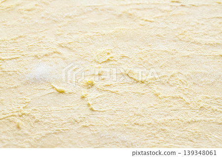 Spread sugar on bread dough Spread sugar on bread dough 139348061