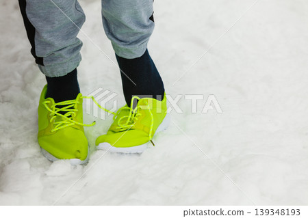 Woman wearing sportswear sporty shoes Woman wearing sportswear sporty shoes 139348193