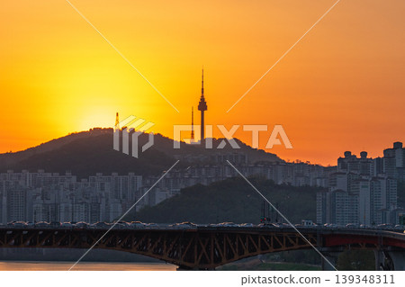 Seoul, South Korea - Apr. 24, 2026 : Sunset Cityscape of Seoul with N Seoul Tower, Seongsu Bridge and Busy Traffic on Gangbyeonbukro Highway Seoul, South Korea - Apr. 24, 2026 : Sunset Cityscape of Seoul with N Seoul Tower, Seongsu Bridge and Busy Traffic on Gangbyeonbukro Highway 139348311