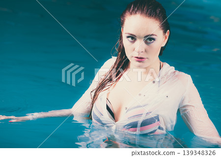 Portrait of mysterious seductive woman in water. 139348326