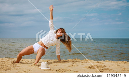 Happy woman on summer beach. Happy woman on summer beach. 139348349