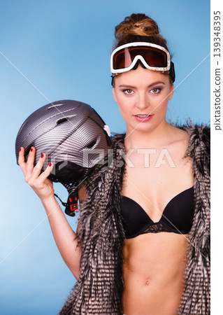 Beautiful girl with goggle and helmet. Beautiful girl with goggle and helmet. 139348395
