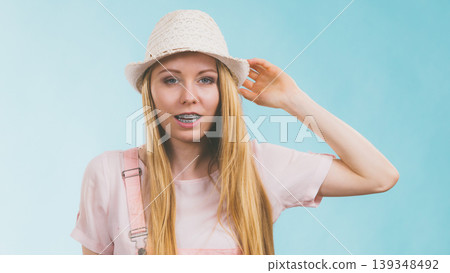 Happy woman wearing summer outfit Happy woman wearing summer outfit 139348492