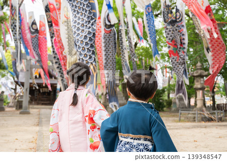 Children's Day: Carp streamers and children in kimonos Children's Day: Carp streamers and children in kimonos 139348547