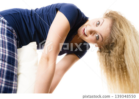 Happy woman brushing her teeth 139348550