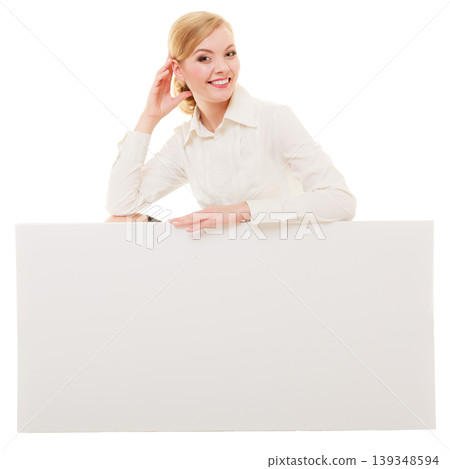 Ad. Businesswoman showing blank copy space banner Ad. Businesswoman showing blank copy space banner 139348594