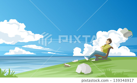 Relax time of man sits alone on a chair outdoors on a grassy hill. hat blew away in the wind, and shoes had to be left behind. Vast ocean backdrop beneath a blue sky and white clouds. Relax time of man sits alone on a chair outdoors on a grassy hill. hat blew away in the wind, and shoes had to be left behind. Vast ocean backdrop beneath a blue sky and white clouds. 139348917