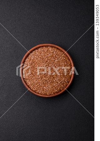Flaxseed as an ingredient for oil, organic flour, and healthy foods. Flax seeds Flaxseed as an ingredient for oil, organic flour, and healthy foods. Flax seeds 139349053