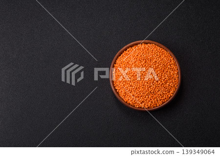 Raw red lentils as a source of protein for a healthy vegan meal. Red lentils Raw red lentils as a source of protein for a healthy vegan meal. Red lentils 139349064
