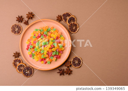 Candied fruit in colorful cubes as an ingredient for baked goods and sweets. Candied fruit Candied fruit in colorful cubes as an ingredient for baked goods and sweets. Candied fruit 139349065