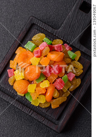 Dried apricots, raisins, and candied fruits as ingredients for baked goods and sweets. Dried fruits 139349067