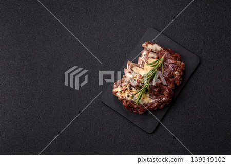 Steak, beef or pork meat grilled or barbecued with salt and spices. Beef steak Steak, beef or pork meat grilled or barbecued with salt and spices. Beef steak 139349102