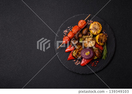 Grilled vegetables: bell peppers, zucchini, eggplant, onions, and corn. Grilled vegetables Grilled vegetables: bell peppers, zucchini, eggplant, onions, and corn. Grilled vegetables 139349103