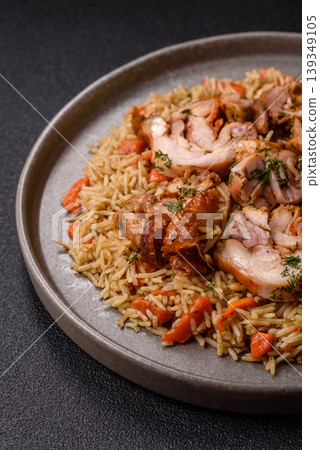 Kabsa or mandi, an Arabic dish with rice and chicken, salt, and spices. Kabsa or mandi Kabsa or mandi, an Arabic dish with rice and chicken, salt, and spices. Kabsa or mandi 139349105