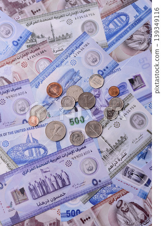 United Arab Emirates cash, dirhams and coins for exchange and financial transactions. UAE currency 139349116