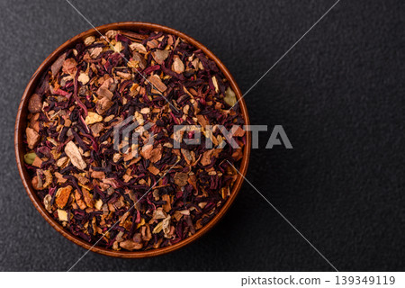 Dry herbal or fruit tea with flower petals and aromatic additives. Dry fruit herbal tea Dry herbal or fruit tea with flower petals and aromatic additives. Dry fruit herbal tea 139349119