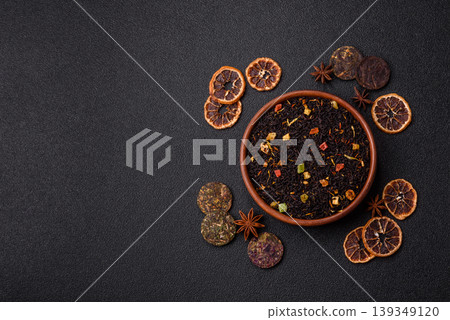 Dry black tea with herbal leaves and aromatic additives. Dry fruity black tea Dry black tea with herbal leaves and aromatic additives. Dry fruity black tea 139349120