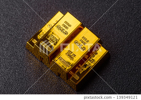 Gold bars or ingots as a metal for bank storage, investments, and financial transactions. Gold bars Gold bars or ingots as a metal for bank storage, investments, and financial transactions. Gold bars 139349121